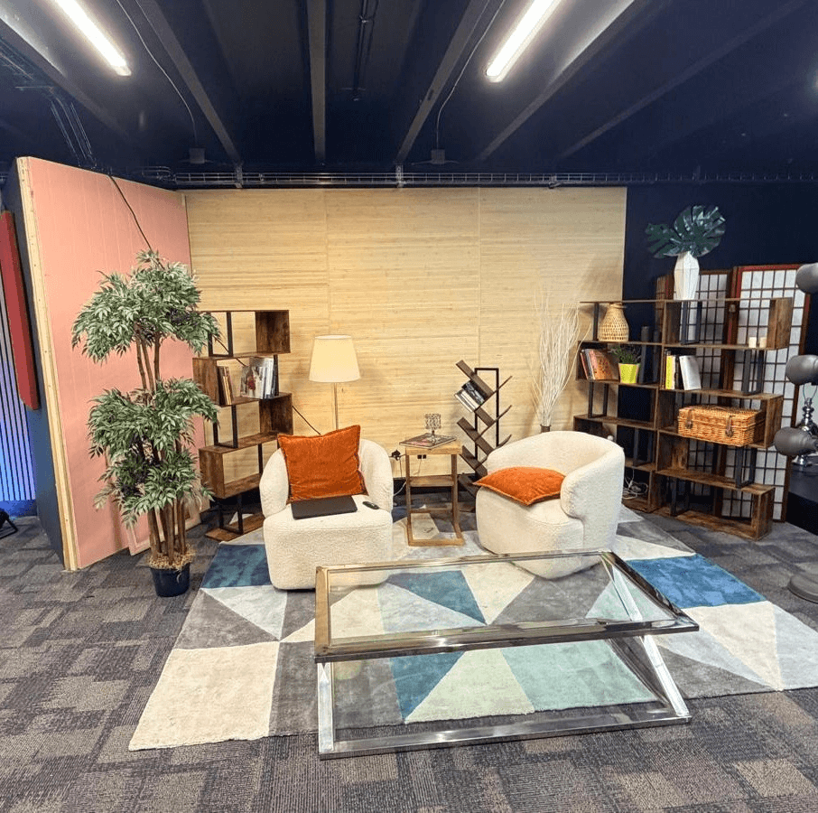 The shared studio podcast and content room with lounge seating